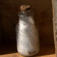 Glass bottle time capsule from 1968 that was discovered in Albuquerque, New Mexico (Screenshot via KQRE)